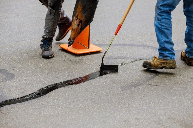 Local Asphalt Crack Filling pros at work